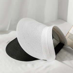 Black and white straw sun visors with wide brims and elastic bands for sun protection
