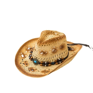 Bohemian straw cowboy hat with turquoise beads and openwork brim for beach trips