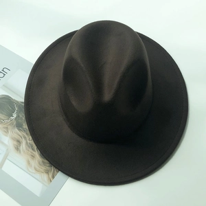 Top view of a classic dark brown wide brim wool fedora hat with a stylish vintage design