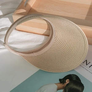 Minimalist beige woven straw sun visor hat for girls with wide brim for summer UV protection