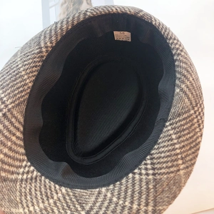 Detail of wool fedora interior showing the size 58 label and breathable lining