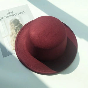 Elegant wine red wool felt boater hat for women with minimalist vintage flat top design