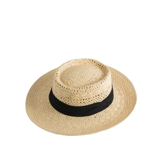 Classic woven straw boater hat with black ribbon, perfect for summer beach sun protection