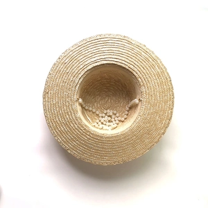 Elegant wide brim wheat straw sun hat for women with pearl chain detail