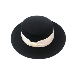 Classic black wool felt boater hat with a contrast cream grosgrain ribbon band
