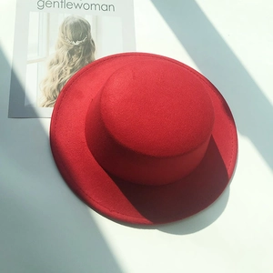 Classic red wool felt boater hat for women with flat top and minimalist British retro style