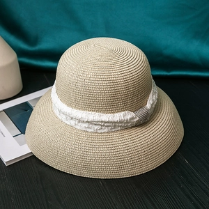 Beige woven straw hat with white pleated ribbon and rhinestone buckle for summer