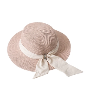Flat top straw sun hat with pink chiffon ribbon and rhinestone buckle for beach travel