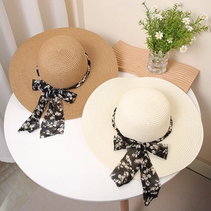 Summer wide brim straw sun hat with floral chiffon ribbon bow in khaki and cream white