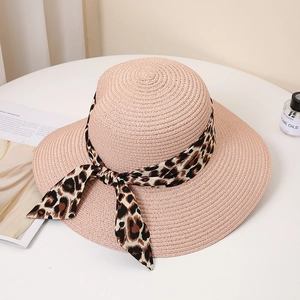 Pink wide brim straw hat featuring a stylish leopard print chiffon ribbon and bow