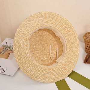 Women's summer straw sun hat with wide brim and adjustable strap for beach vacations