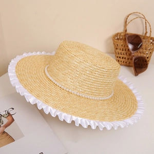 Women's summer straw hat with flat top, pearl trim and white silk ruffled brim