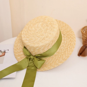 Elegant summer boater straw hat with olive green satin ribbon and bow detail