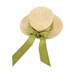 Flat top straw sun hat with elegant green silk ribbon bow for beach vacation women