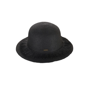 Chic black straw sun hat with fringe edges and metal logo plate on white background
