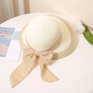 Elegant summer straw sun hat with ribbon bow and color block design for beach vacations