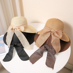 Summer wide brim straw sun hats with elegant ribbon bows in beige, black, and tan styles