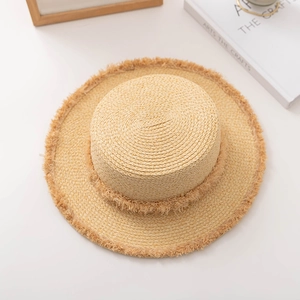 Chapeau de paille à haut plat avec bords effilochés pour vacances à la plage