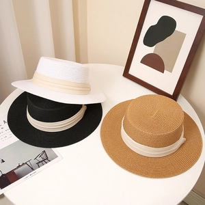 Flat top straw boater hats for summer in black white and tan with wide ribbon bands