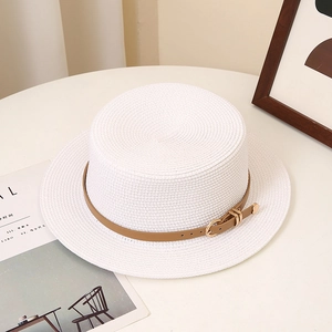 Flat top wide brim straw sun hat for women with a brown adjustable leather belt strap