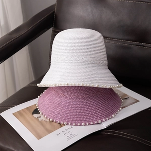 Elegant women's summer sun hat with pearl trim and lace detail in white and lavender