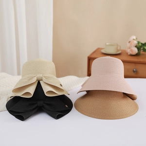 Women's summer straw sun hats with bow decoration in four versatile colors