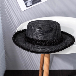Chic black flat top straw boater hat with frayed edges for outdoor sun protection