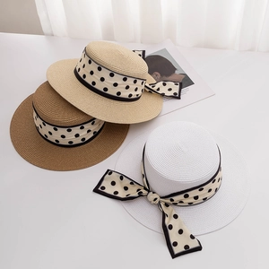 French style boater straw hats in white and beige with polka dot ribbon bows