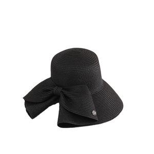 Elegant black wide-brim woven straw sun hat with large bow and metallic M logo accent