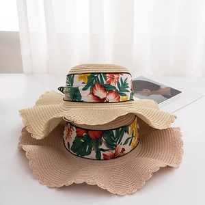 Summer wide brim straw sun hat with floral ribbon and elegant wavy petal edge for women