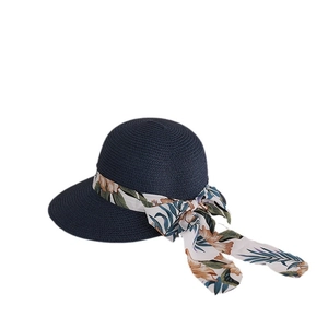 Wide brim blue woven straw sun hat with floral printed ribbon for summer beach vacation