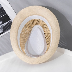 Detail view of woven paper straw fedora with sweatband and teardrop crown structure
