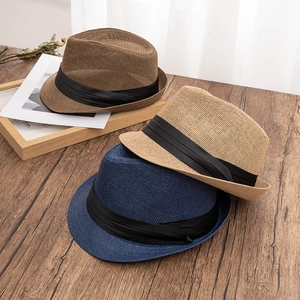 Classic summer paper straw fedora hats with black ribbons in brown, beige, and navy colors