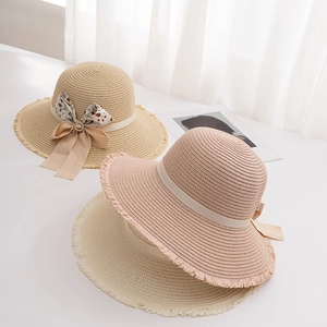 Straw sun hats for women featuring bow tie, fringed edges, and floral accents in three colors
