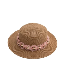 Women's summer straw sun hat with flat top and pink floral silk decoration in khaki color