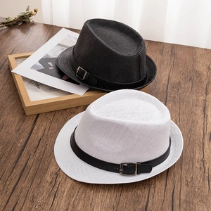 Classic straw fedora hats in black and white with stylish leather belts and metal buckles