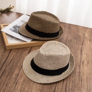 Classic vintage summer fedora hats in brown and cream with breathable woven texture