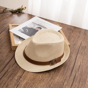British style beige straw fedora hat with brown leather belt and silver buckle