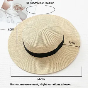 Close-up of beige boater hat showing dimensions 56-58cm with black ribbon band