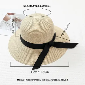 Detailed size map of beige straw hat with 8cm wide brim and black ribbon bow detail
