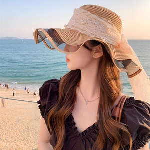 Straw sun hat with lace pearl trim and long ribbons, beach vacation style for women