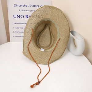 Handmade straw cowboy sun hat with adjustable chin strap for beach and outdoor activities