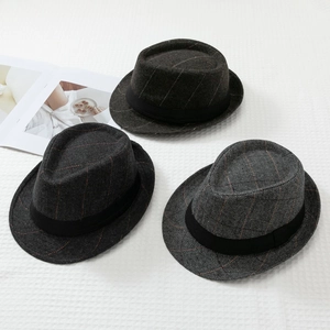 Three men's retro wool fedora hats with herringbone and plaid patterns and black ribbon bands