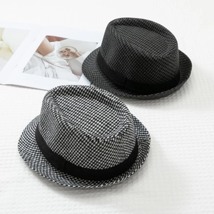 Classic houndstooth fedora hats for men featuring black ribbon trim and woven texture