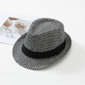 Classic black and white houndstooth trilby hat with matte ribbon for men on white background