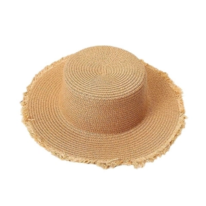 Flat top straw sun hat with wide frayed brim and natural texture for beach travel