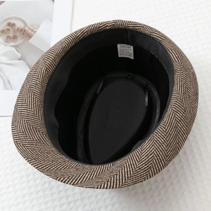 Detail of internal lining, 58cm size label, and fabric composition of the fedora hat