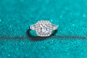 Macro detail of S925 silver ring featuring Asscher cut moissanite and halo setting