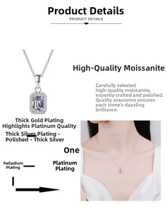 Macro view of rectangular emerald-cut moissanite necklace with diamond halo on silver chain