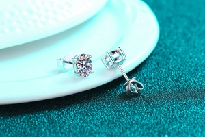 Macro shot of S925 sterling silver stud earrings featuring six-prong moissanite setting